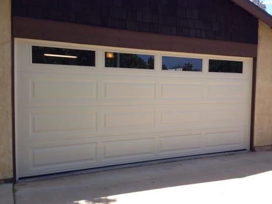 Brand new Almond, Long Panel, Insulated door!! 16x7