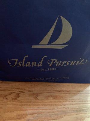 Their shopping bag - IP the Clothing Boutique for Men & Women @  Island Pursuit on Main St. in Cape Cod Chatham MA