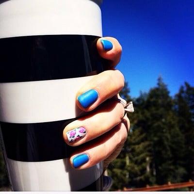 Matte blue nails with rose accent nail