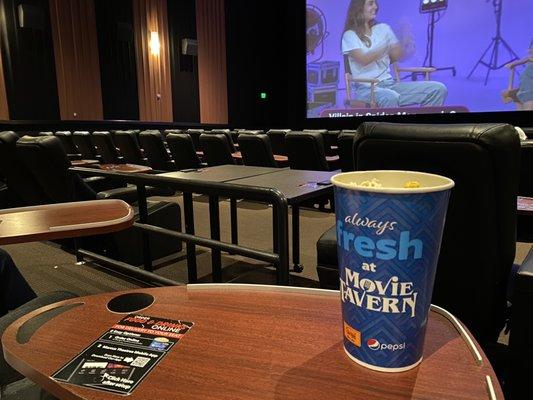 Movie Tavern Theater before the show begins. Free popcorn on $5 Tuesdays!