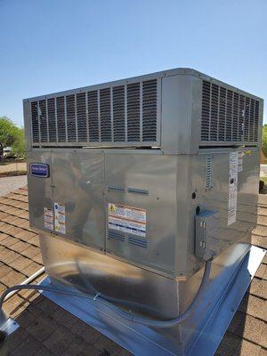 American Standard package heatpump with downflow roof curb