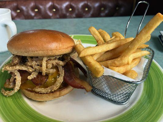 Burger with Bacon and crispy onions. Fries.