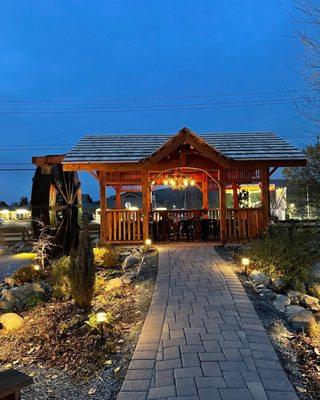 Outdoor dining next to the Watermill.