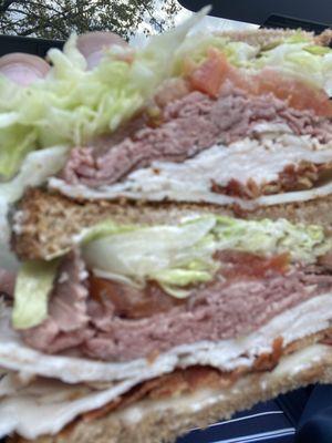 Turkey and beef club sandwich cross section