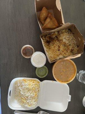 Veggie Samosa, Nawabs Chef Special Chicken Dum Biryani,  Murgh Tikka Kabab which comes with rice.