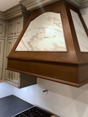 Range hood in marble.