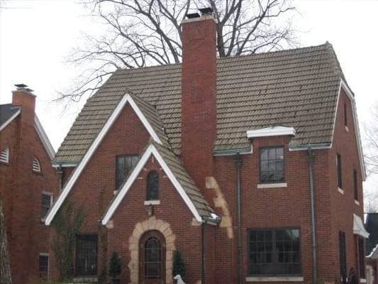 Grinding and tuckpointing entire chimney