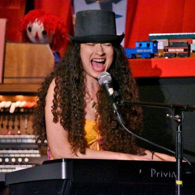 Playing piano for a Vaudeville show