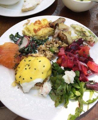 Duck bacon benedict, various salads, smoked salmon, vegetable quiche, sausage and apple