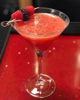 The Red: Premium Vodka, fresh raspberries, mint, lime juice, simple syrup, and prosecco