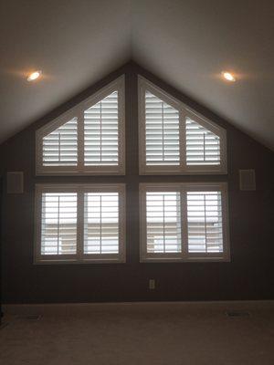 Wood shutters on angled arch