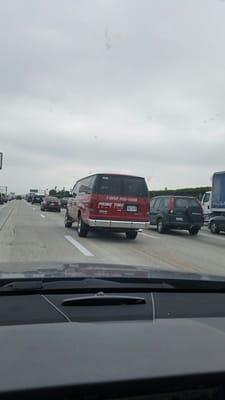 8:30 a.m.,4/22/16 110 North, this van made a dangerous and illegal lane change nearly causing a freeway accident.