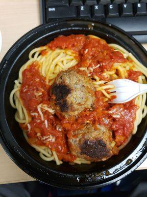 Burnt meatballs, lots of spaghetti and hardly and sauce.