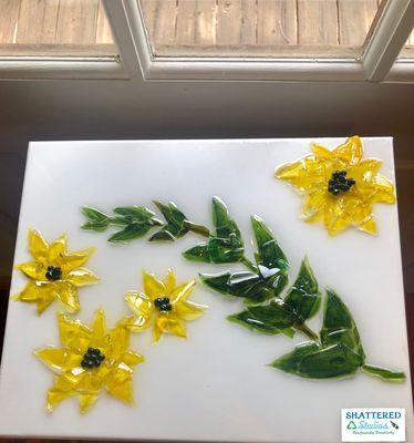 Create a beautiful masterpiece using recycled glass at Shattered Studios.