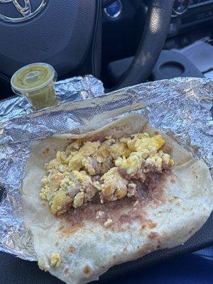 Ham and egg taco with beans, very bland flavor