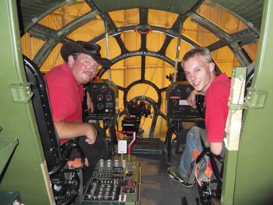 Pristine Detailing, LLC sitting in the Cockpit of a very rare B-29 Bomber at the Museum Of Flight in Washington.