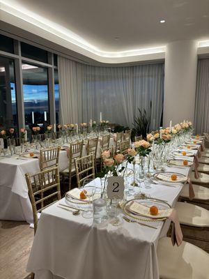 Gold and white chivari chairs and long tables were rented from deluxe rentals