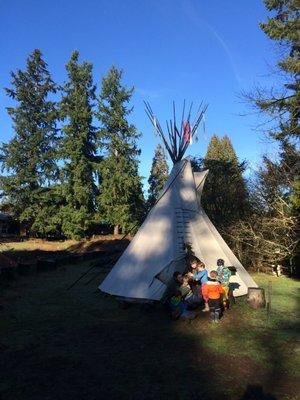 Our authentic tipi on-site is a cozy and inviting community spot to gather and read.