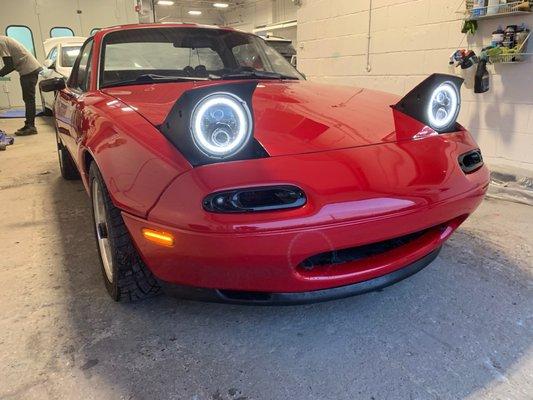 Mazda Miata NA getting fresh paint and custom work.