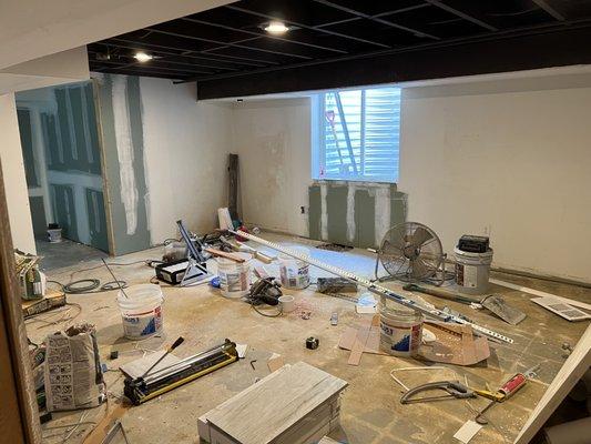 Bathroom in the far corner and bedroom. We will install luxury vinyl flooring and paint the walls