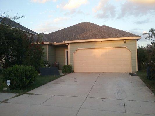 New garage door Gutters and paint and the new 30 year dimensional roof