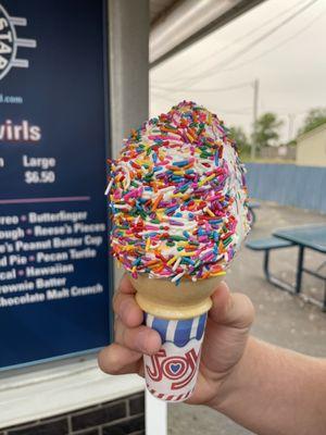 Cherry vanilla twist with rainbow sprinkles