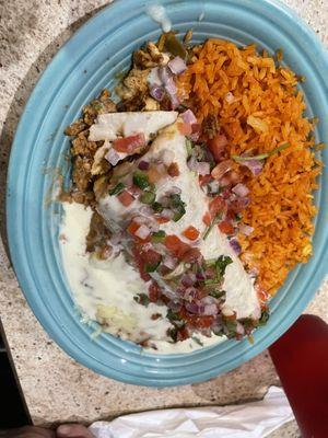 Don José burrito with rice and beans covered in melted cheese