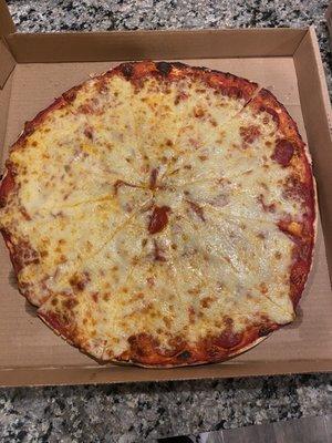 Large pepperoni. Note the pepperoni's are under the cheese.