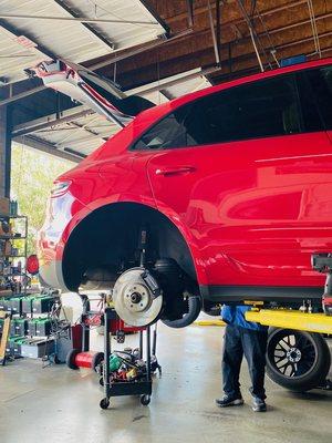 Jimmy working on porsche brakes