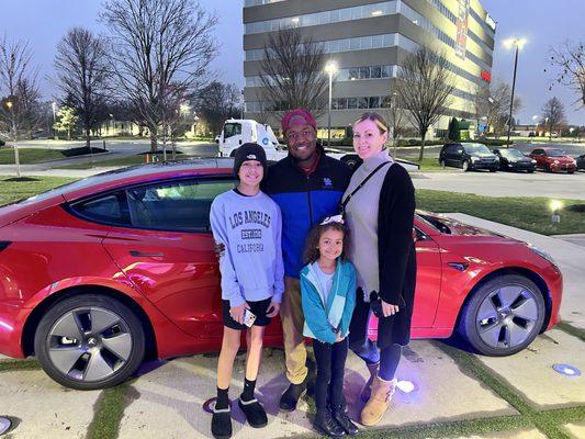 The family and I after I purchased my used Tesla model 3 2022