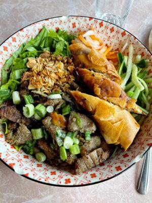 A very tasty bowl of bún thịt nướng. Hot, crispy egg rolls, tasty pork