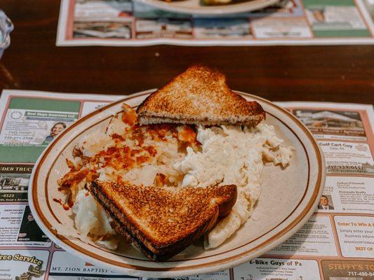 Two egg whites, home fries and wheat toast