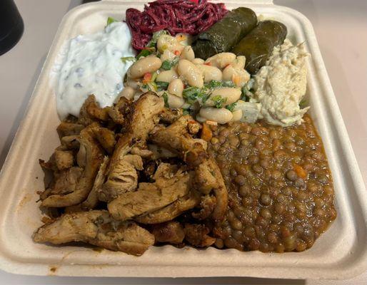 Fresh chicken rice lentil bowl with salad