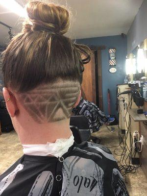 Women's undercut with design/graphics.