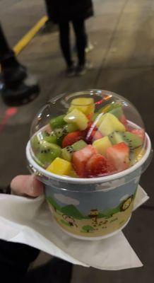 Mango, strawberry, and raspberry frozen yogurt with kiwi, pineapple, strawberry, mango, and bursting boba topping