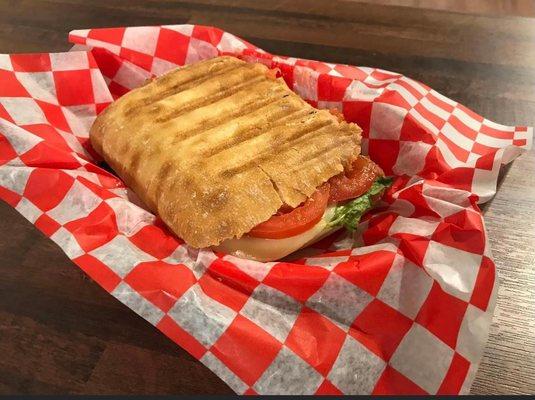 We have grilled sandwiches on Ciabatta Bread called Paninis.