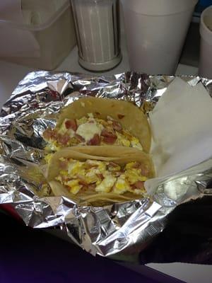 Ham and Egg breakfast tacos on corn tortilla.