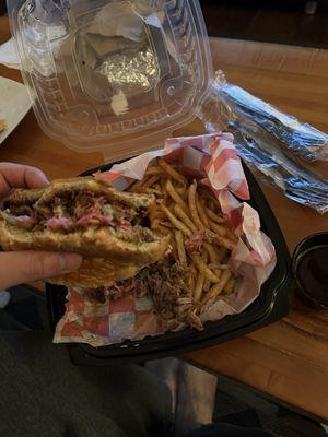 Pulled Pork Sandwich with dry rub fries.