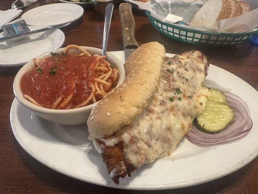 Italian Steak Parmigiana Sandwich with a side of spaghetti. Yum!