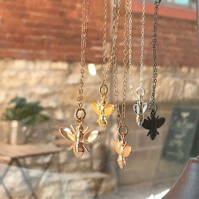 Bee necklaces in assorted metals