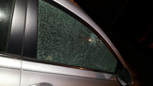 Bullet hole while car parked in assigned parking spot due to an armed robbery