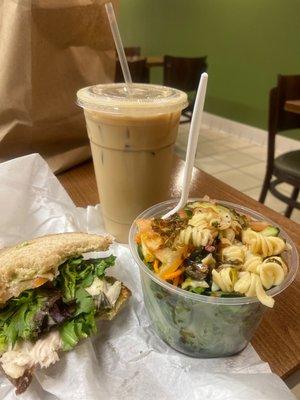 Haft chicken pesto Sandwich and mix greens salad  and ice coffee