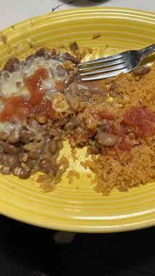 Off menu special order rice & beans topped with a little salsa.