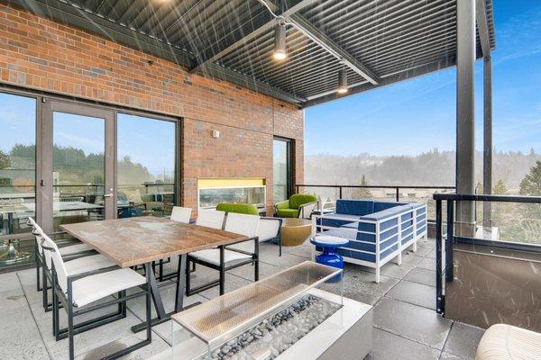 Fifth floor patio with breathtaking views and firepit.