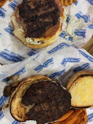 Delivered these two charred hockey pucks to us. & also left 2 toppings off my burger!