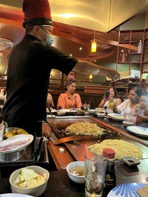 Hibachi grill, chef cooking, noodles and rice