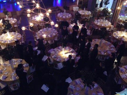 New York City Tapuz event staff setting tables and preparing to serve a seated dinner