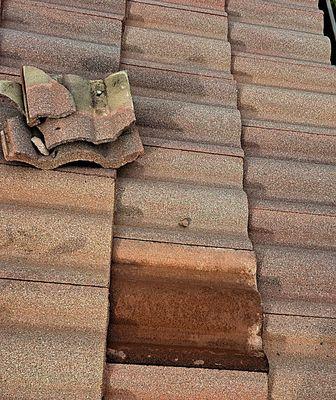 Damaged roof repaired by Weathertight Roofing Company Inc.Hemet,California