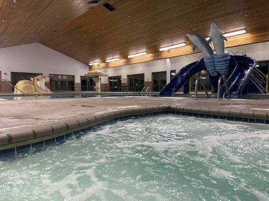 An indoor kids pool. A water slide and hot tub