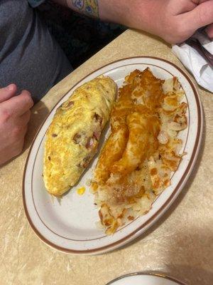 Meat omelette with hashbrowns. Large portions